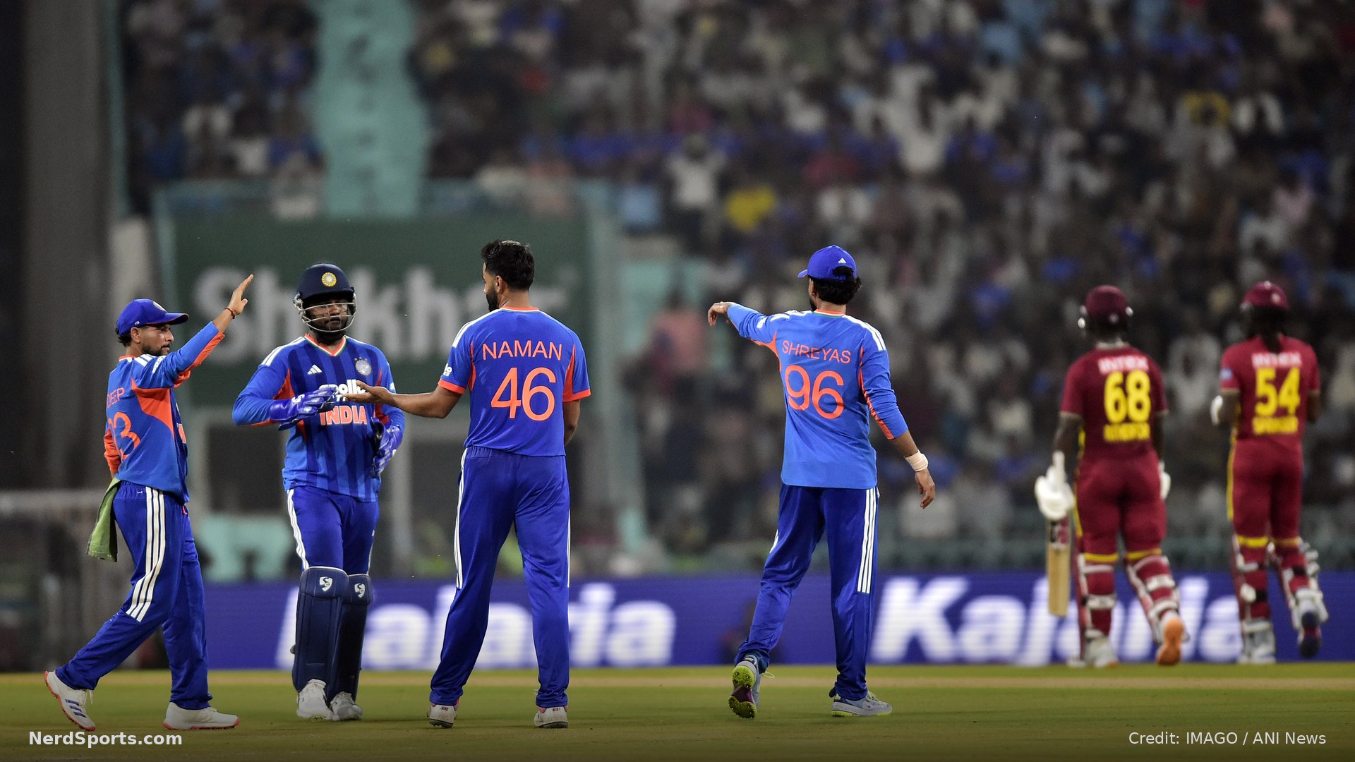 India's Naman Dhir and teammates celebrate the wicket of West Indies Shamar Springer during the 1st T20I, Oct 06, 2026