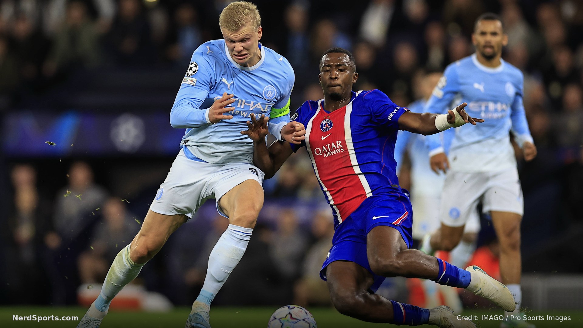 Erling Haaland of Manchester City and William Pacho of Paris Saint-Germain challenge for the ball during the game on 14 October 2026.