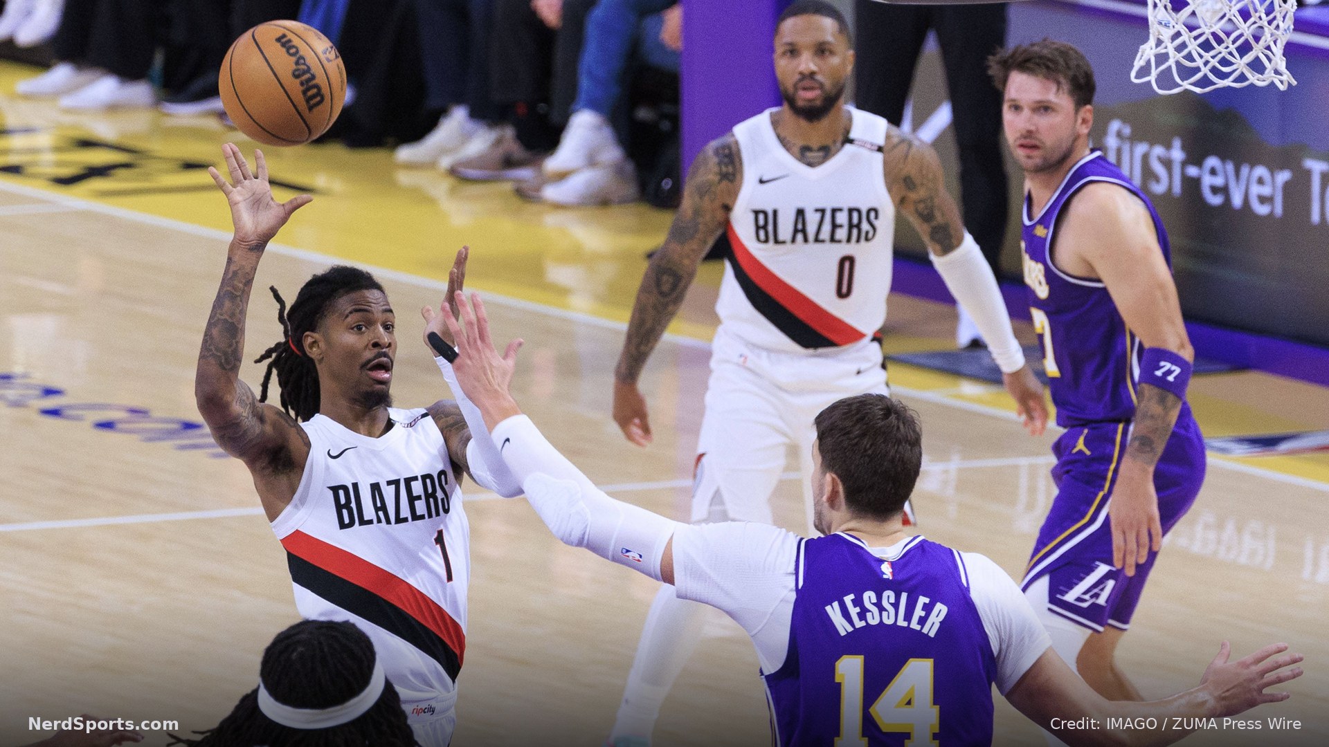 Ja Morant 1 of the Portland Trail Blazers throws up a lob as Walker Kessler 14 of the Los Angeles Lakers defends the basket during their regular season game on Tuesday October 27, 2026.