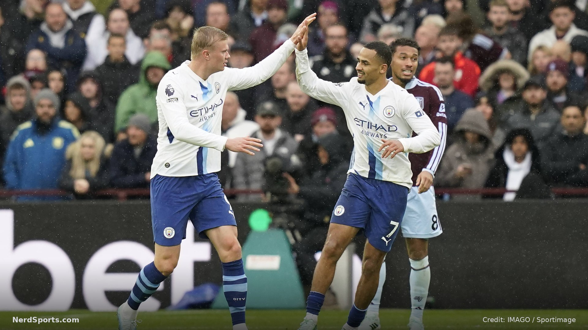 Erling Haaland of Manchester City celebrates with teammate Iliman Ndiaye after scoring to make it 1-1 during the Aston Villa vs Manchester.