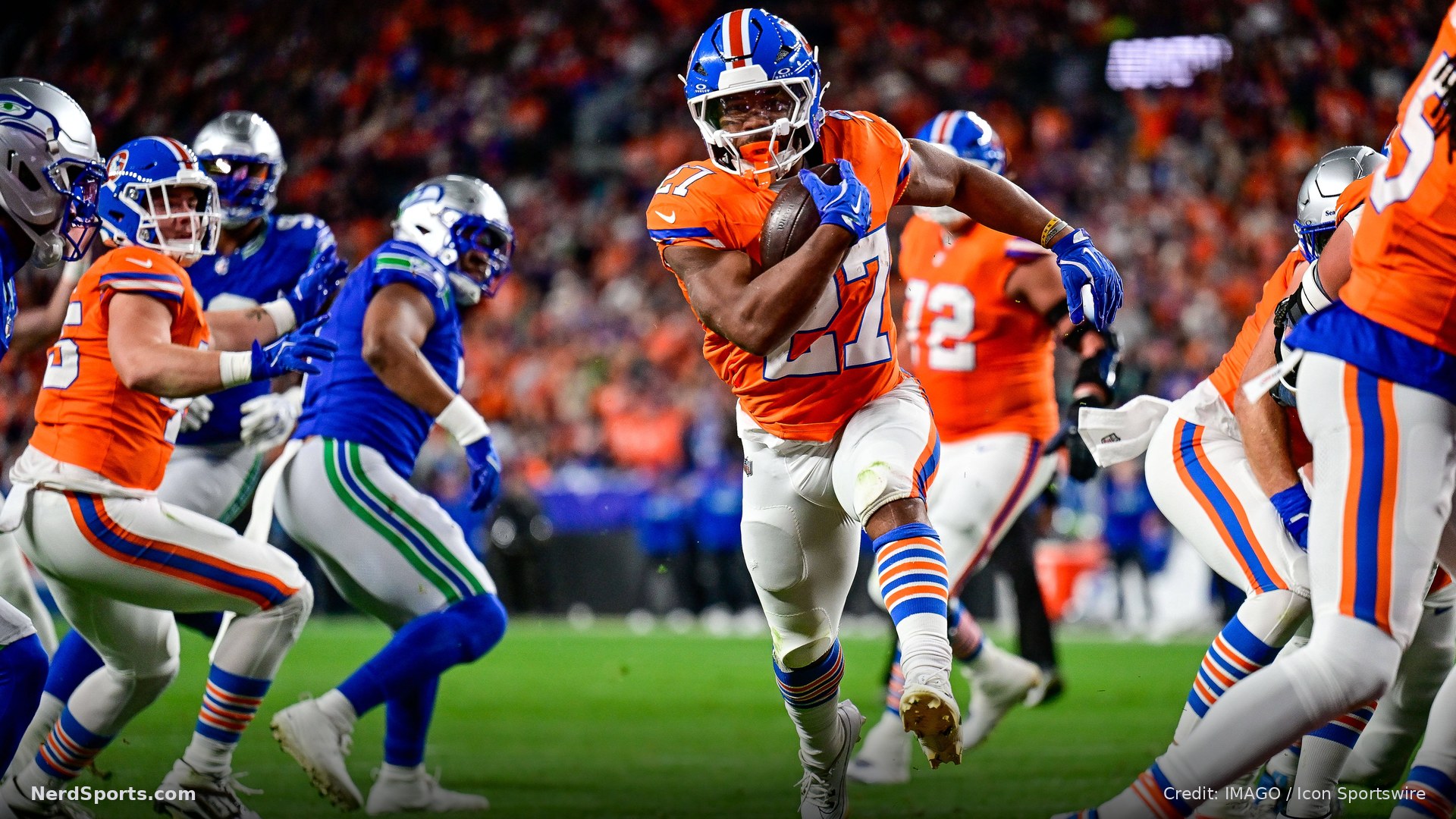 Denver Broncos running back J.K. Dobbins (27) runs and scores a second quarter touchdown during a game between the Seattle Seahawks and the Denver Broncos on October 15, 2026.